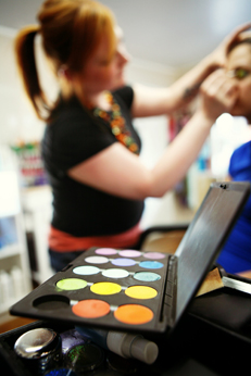 artist applying make-up